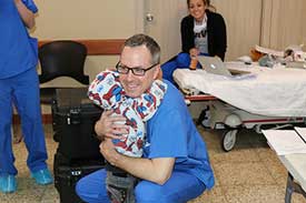 Surgical Mission: Dr. Morin and little child