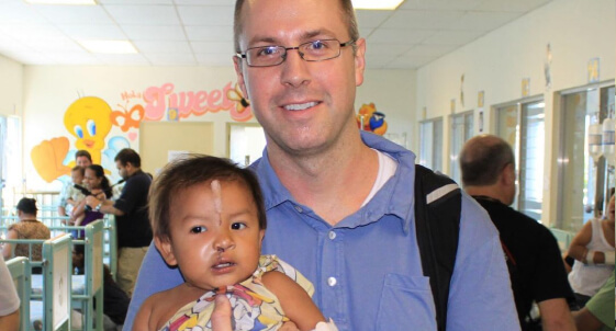 Mission in Guatemala - Dr. Morin with little child