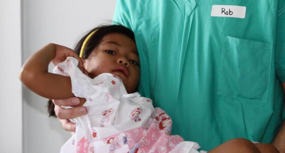 Mission in Guatemala - Dr. Morin with little girl child