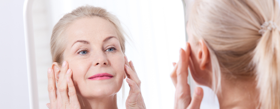 deep plane facelift recovery: mature lady admiring her facelift results